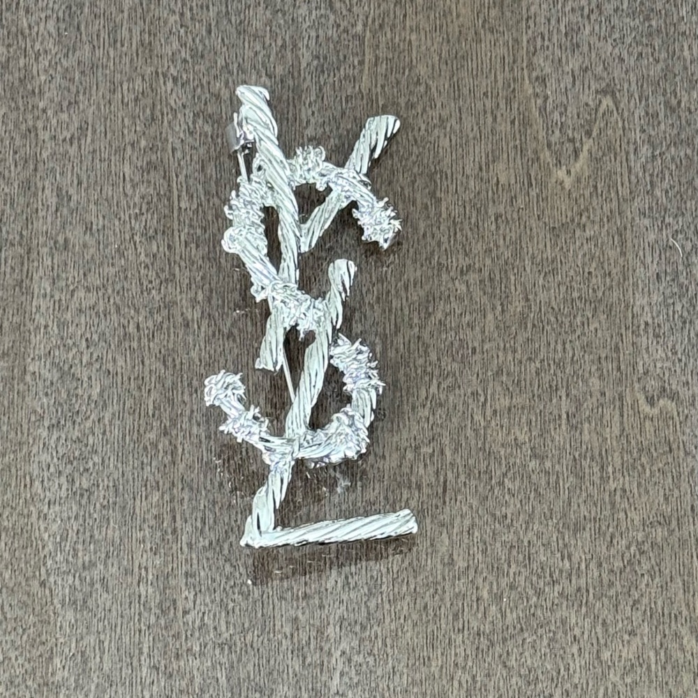 Faux Yves Saint Laurent Silver Brooch